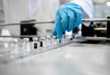 Breakthrough ‘lab-made’ compound to slow Alzheimer’s disease A healthcare professional in a lab preparing vaccine vials