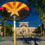 Climate Change Adaptation: Phoenix Heat Hack Hides in Plain Sight Colorful sign of the Phoenix Pride Commission in front of a government building