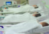 Tiny Oxygen Dips, Lifelong Brain Twist Newborn infants resting in hospital cribs in a nursery
