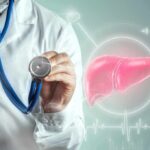Doctor holding a stethoscope with a digital liver graphic