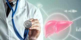 Doctor holding a stethoscope with a digital liver graphic
